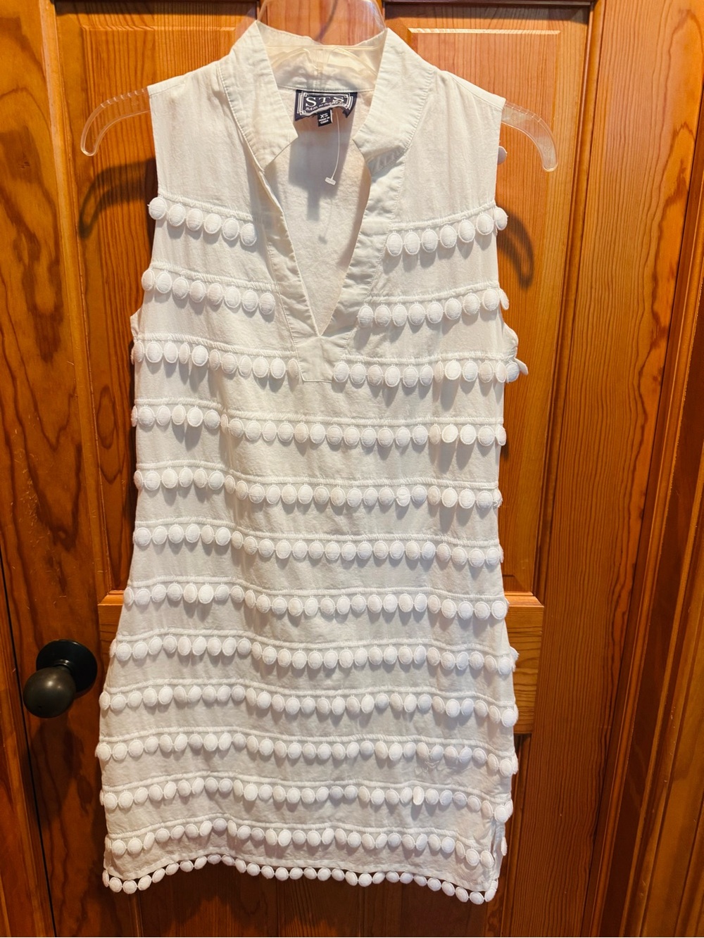 Sail to Sable white v neck fringe dress